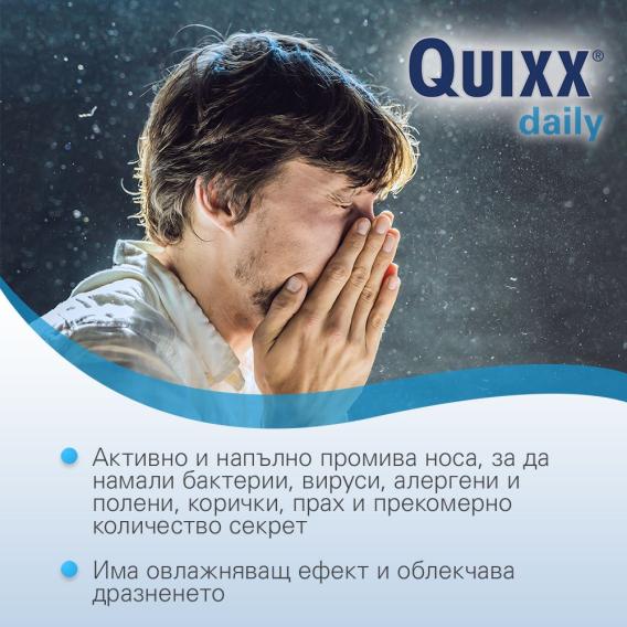 Man covering his nose in a dusty environment.