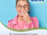 Happy woman touching her nose